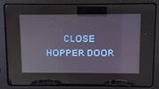 Close hopper door