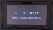 Insert coffee grounds drawer